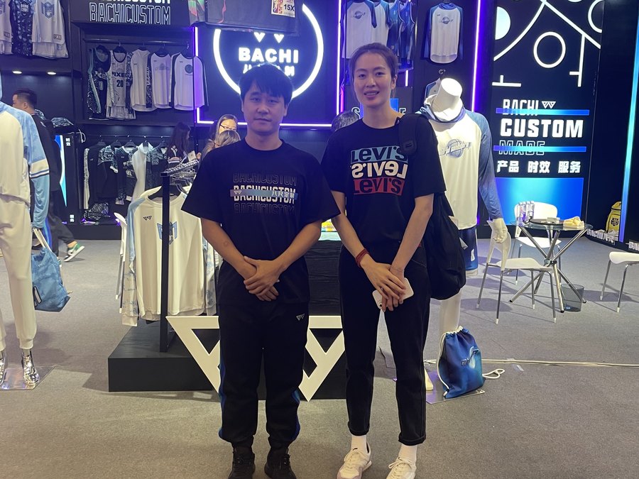 BACHI SPORTS representatives at their exhibition stand